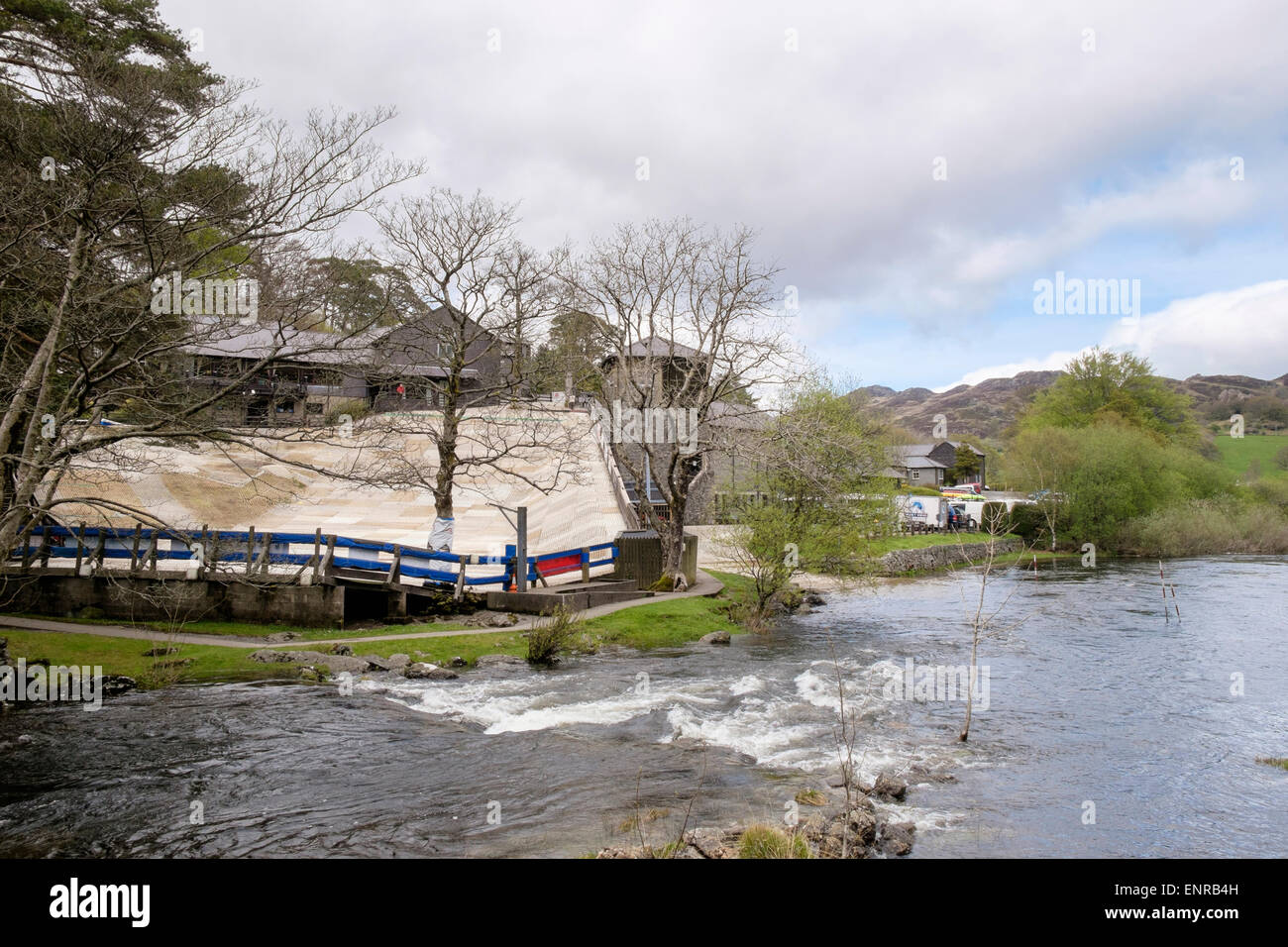 Plas Y Brenin national mountain sports centre with artificial ski slope  from across Afon Nantygwryd River. Capel Curig Wales UK Stock Photo - Alamy