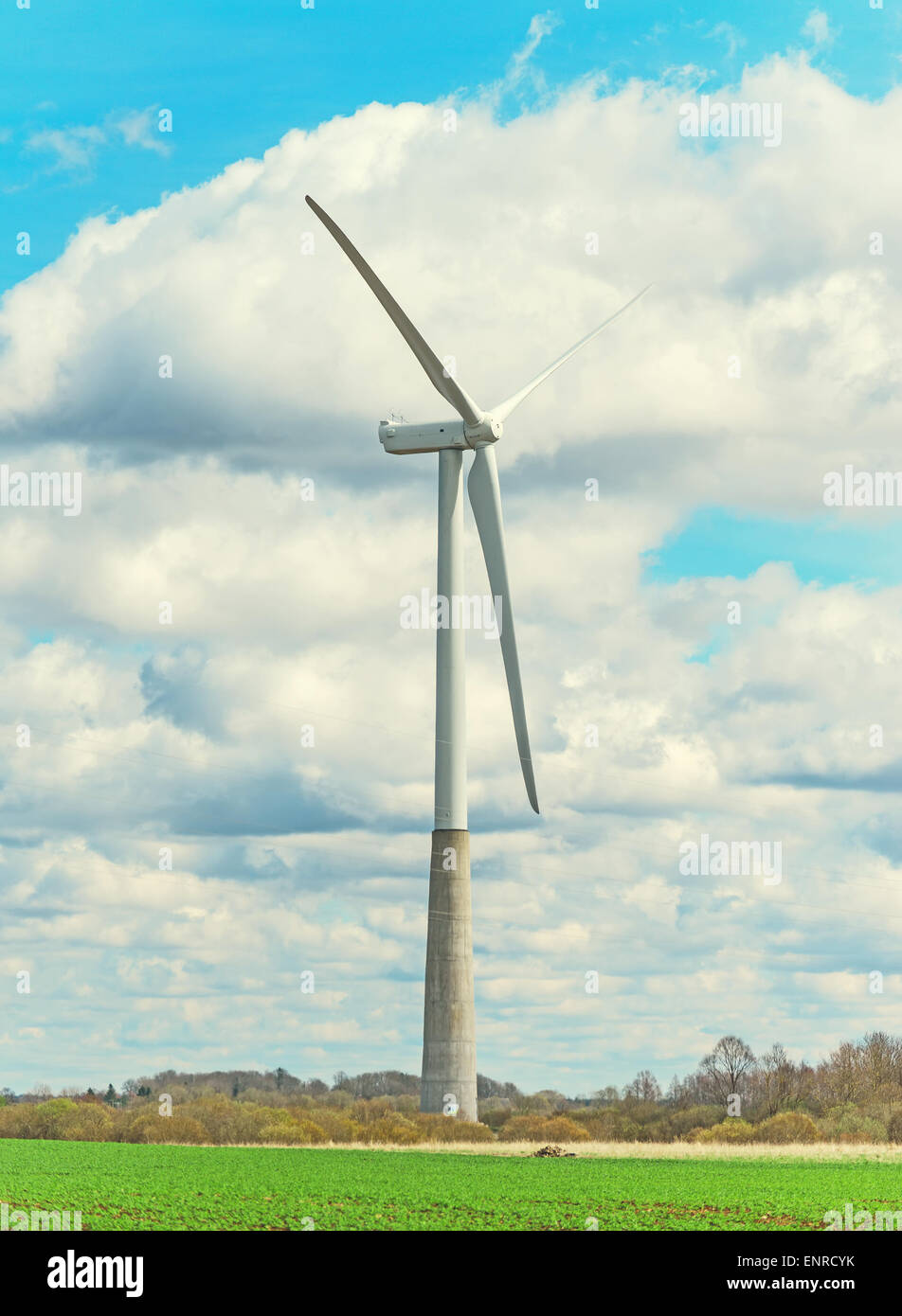 View of Wind turbine over blue sky Stock Photo - Alamy