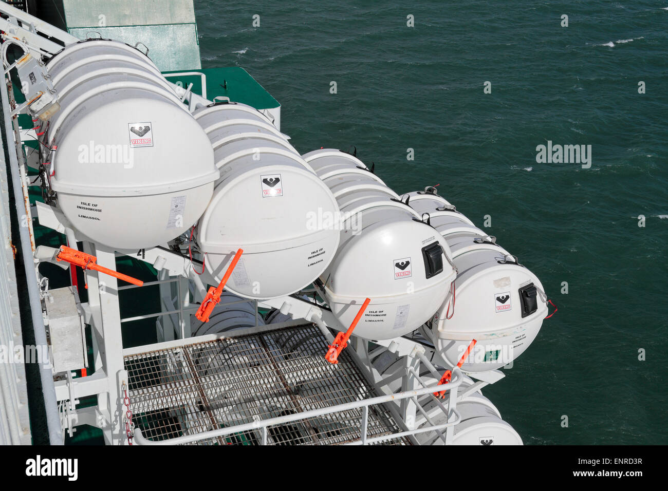 A rack of Viking branded inflatable life rafts on the Irish Ferries owned ferry, the 'Isle of Inishmore'. Stock Photo
