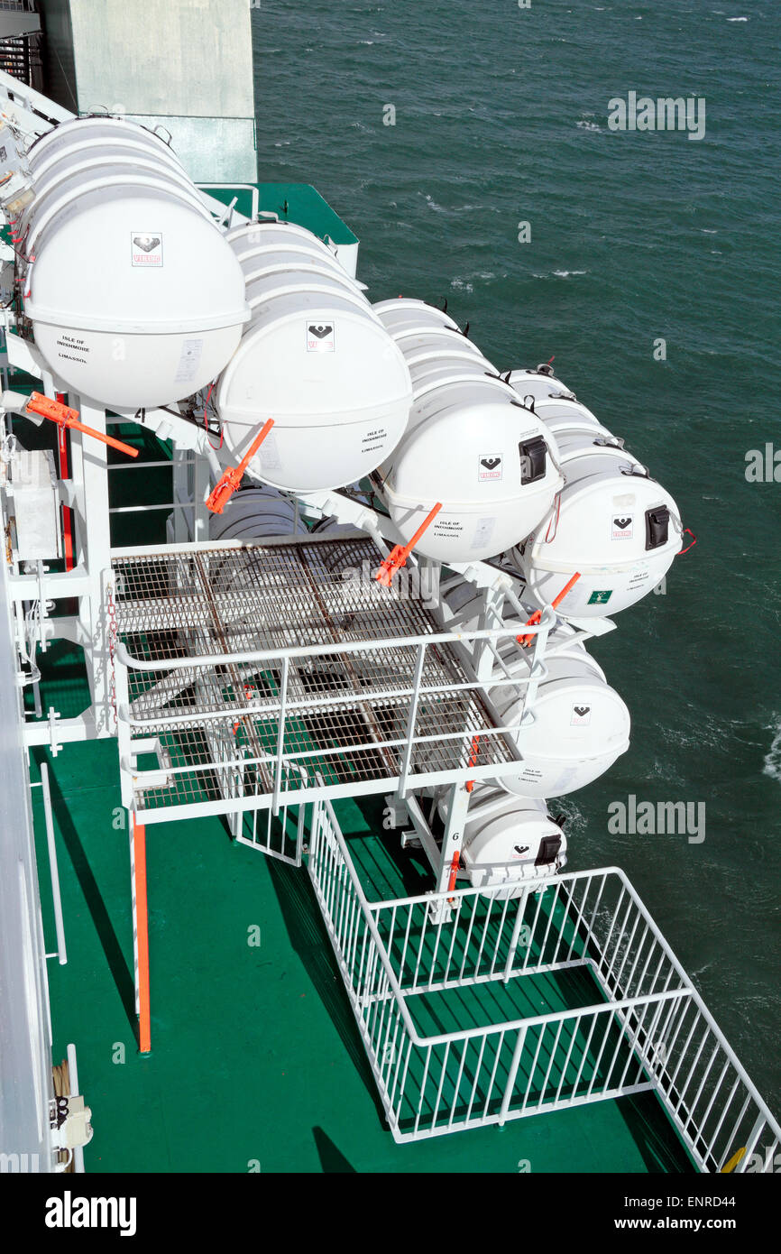 A rack of Viking branded inflatable life rafts on the Irish Ferries owned ferry, the 'Isle of Inishmore'. Stock Photo