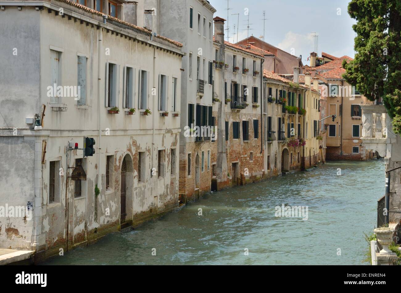 Old houses along a canal in Venice, Italy Stock Photo - Alamy