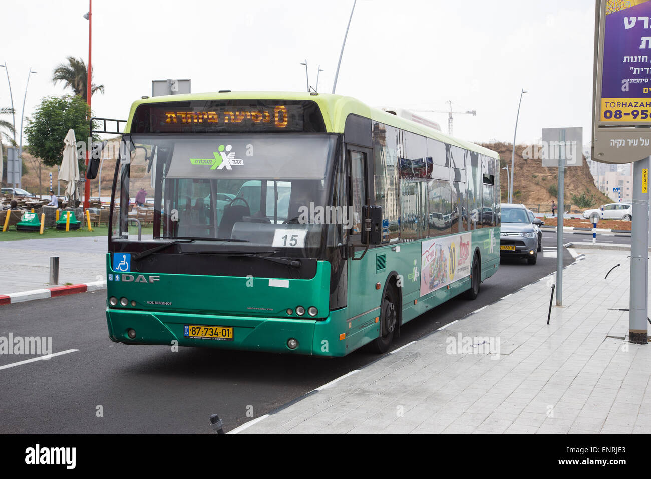 Green Israeli passenger bus in Ashdod City Israel Stock Photo