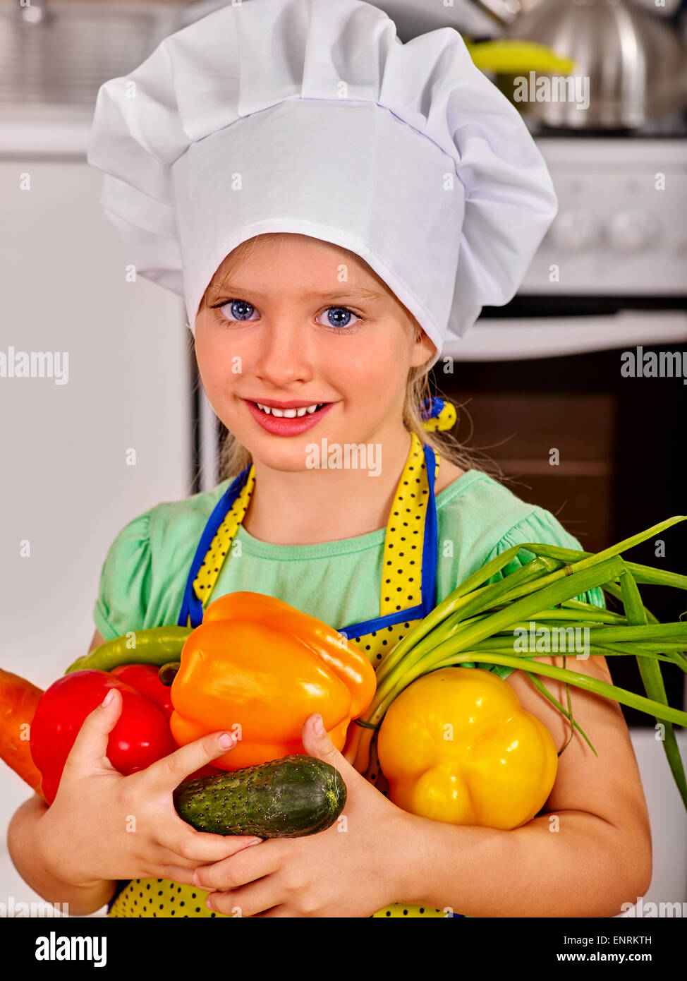 Child cooking at kitchen Stock Photo - Alamy