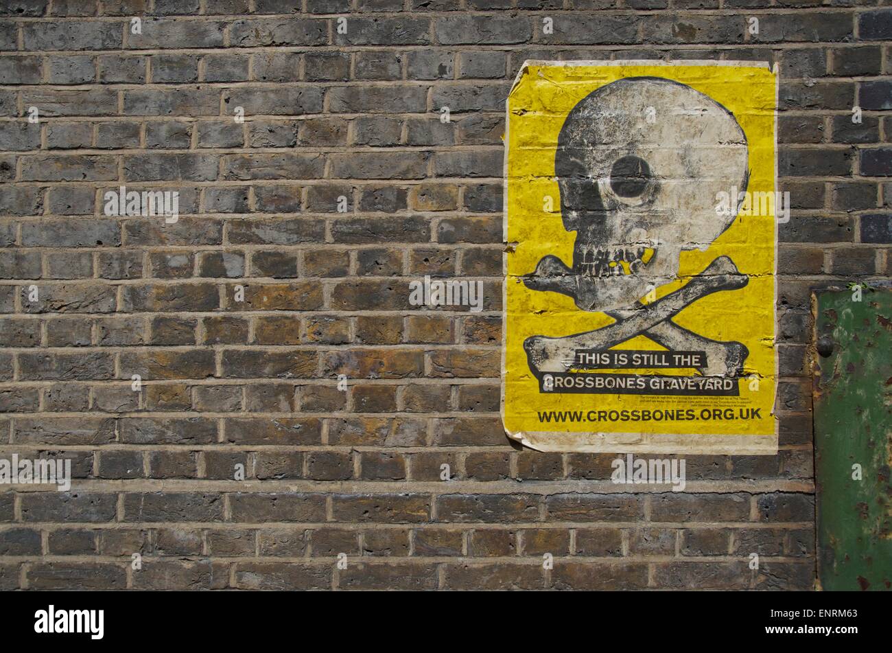 Poster on the Wall Outside the Cross Bones Graveyard, Southwark, London, SE1 Stock Photo