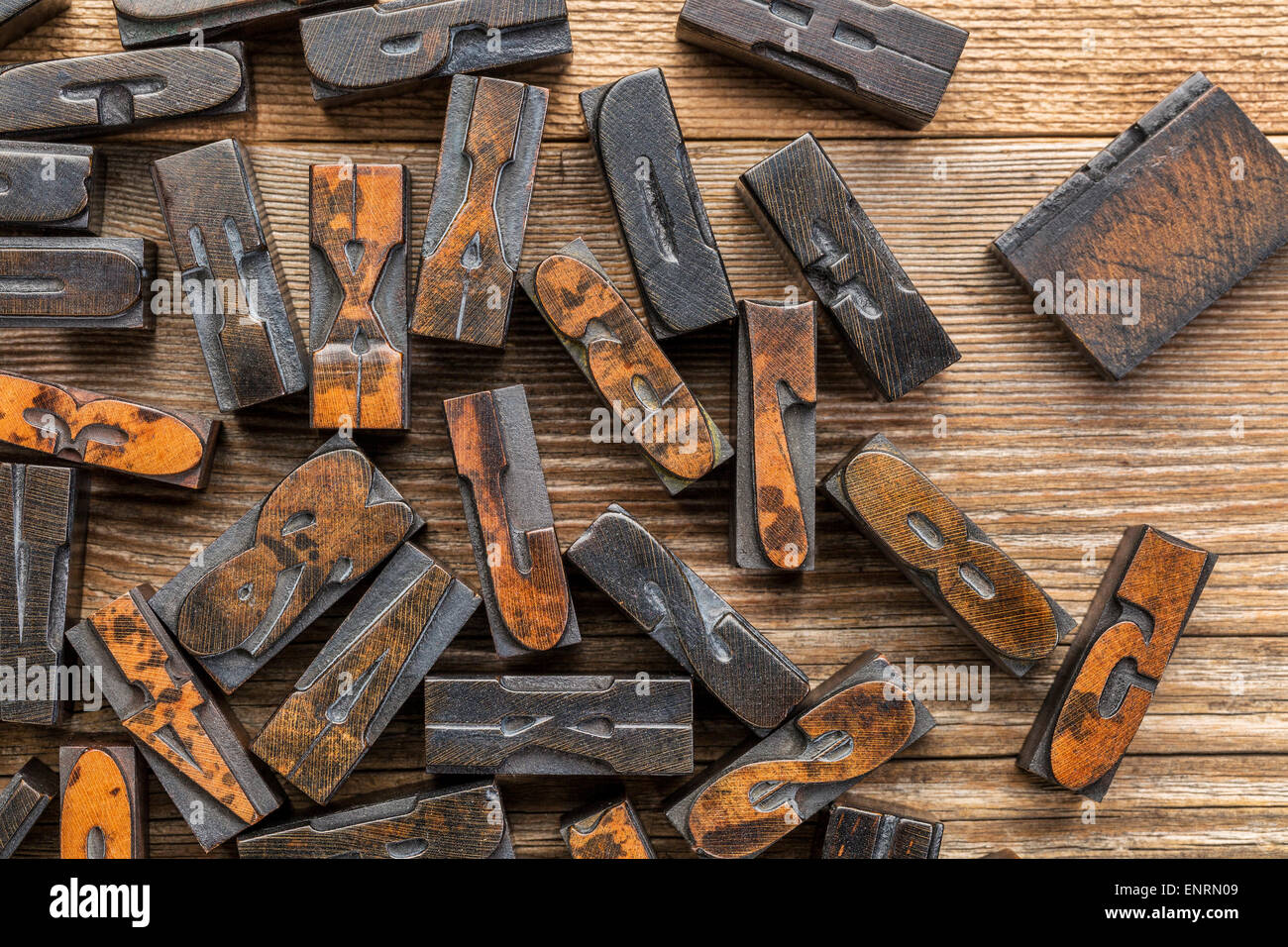 vintage letterpress wood type printing blocks stained by inks placed