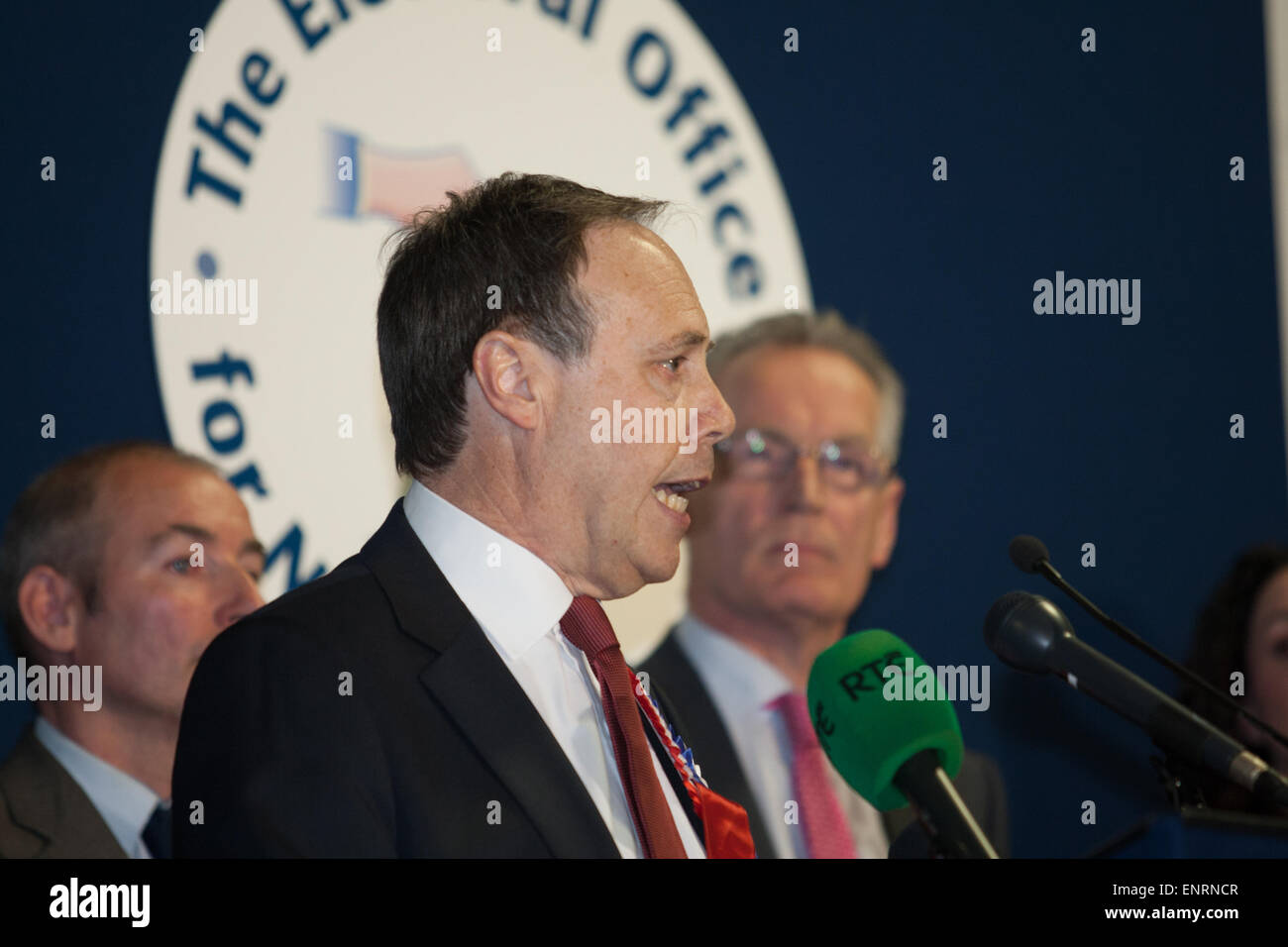 Belfast UK. 7th May 2015 General Election:  DUP Nigel Dodds (Gerry Kelly Sinn Fein in background) gives his acceptance speech Stock Photo