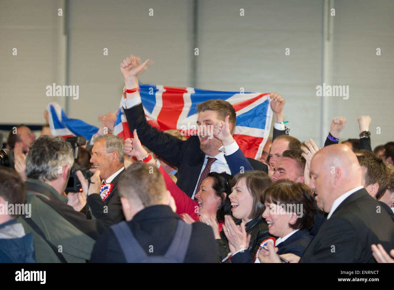 Belfast UK. 7th May 2015 General Election: Democratic unionist party (DUP) supporter celebratie after  Gavin Robinson won the se Stock Photo