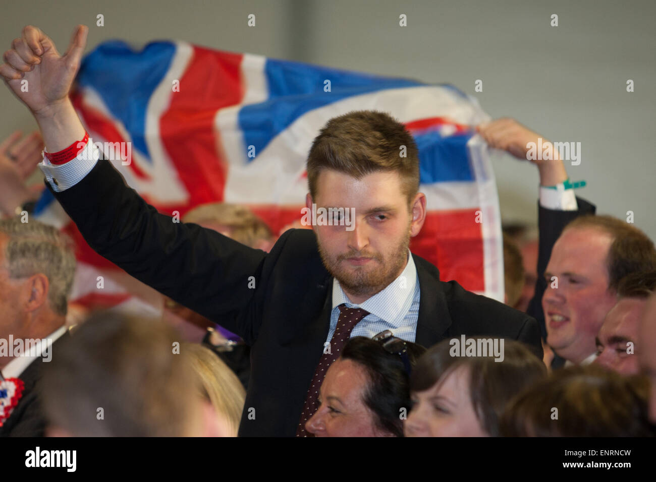 Belfast UK. 7th May 2015 General Election: A DUP supporter celebrating after  Gavin Robinson won the seat of Belfast East. Stock Photo