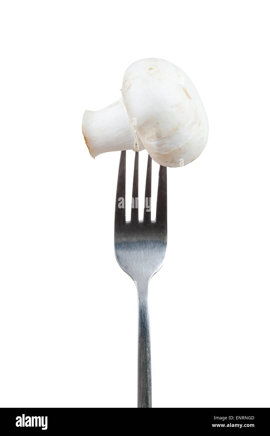 Champignon on a fork isolated on white background with clipping path Stock Photo