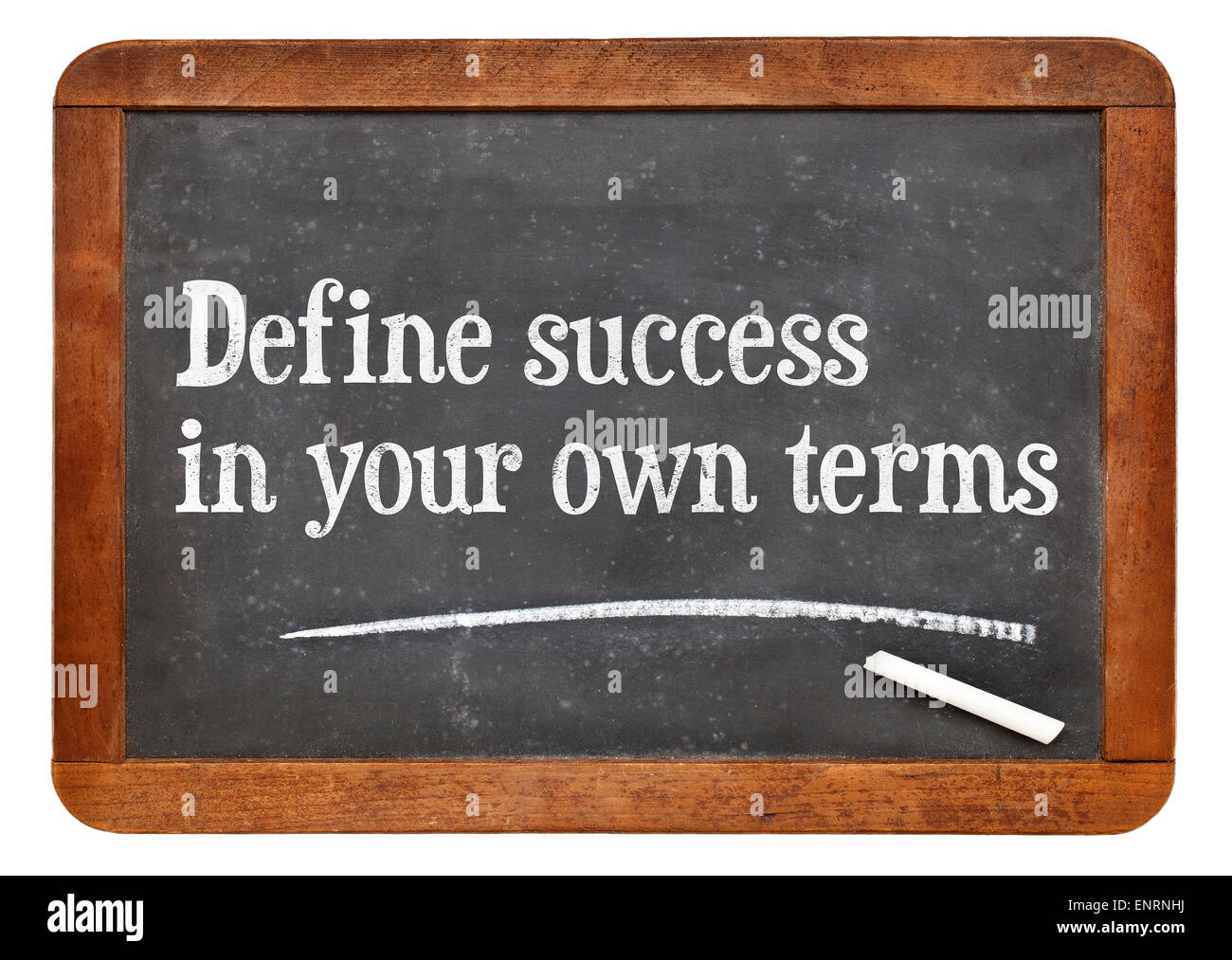 Define success in your own terms - inspirational words on a vintage slate blackboard Stock Photo