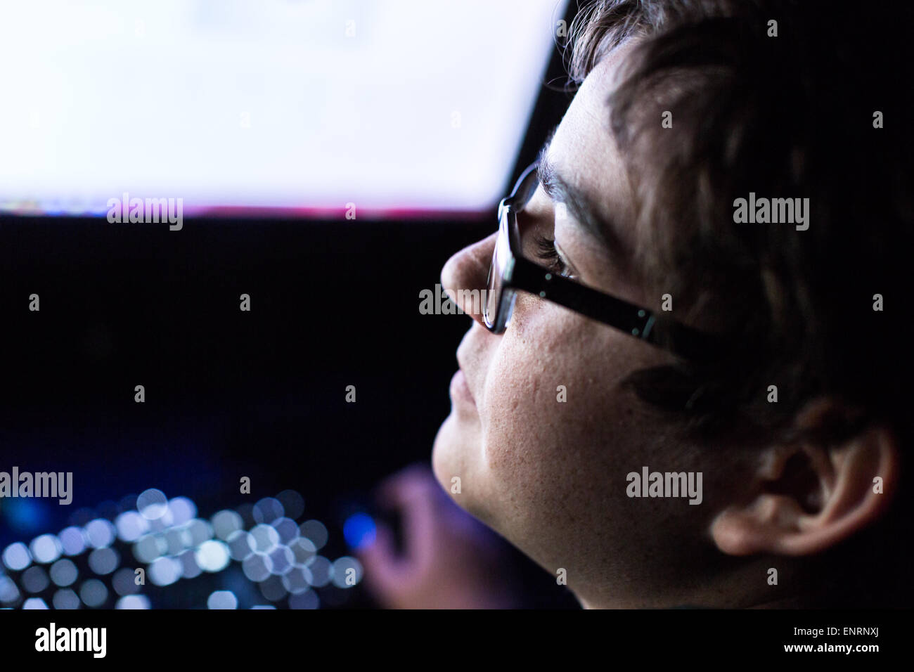 Teenager boy on computer in his room late at night Stock Photo - Alamy