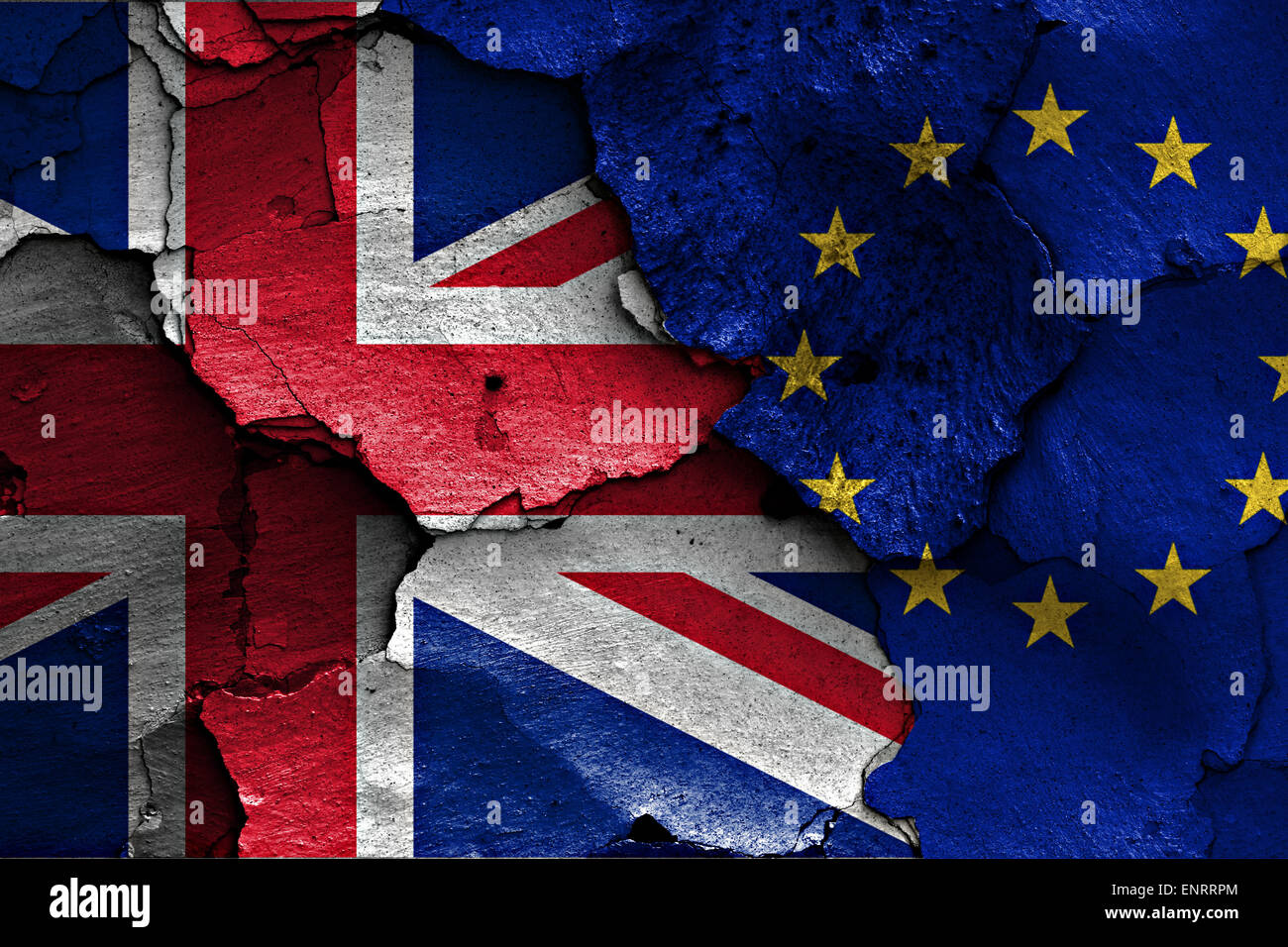 flags of UK and EU painted on cracked wall Stock Photo