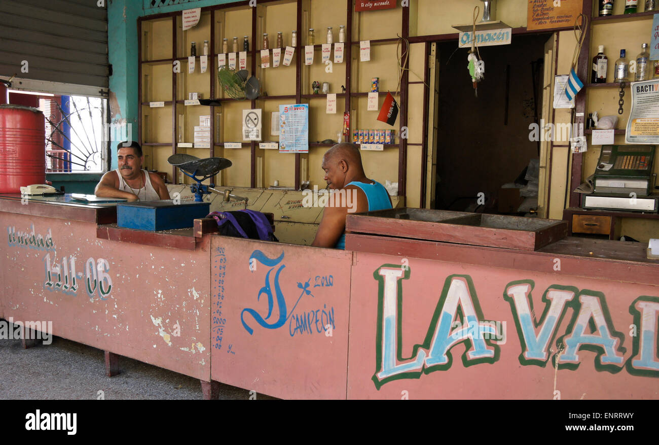 Clerks at government store (bodega) where ration cards are used, Regla, Cuba Stock Photo