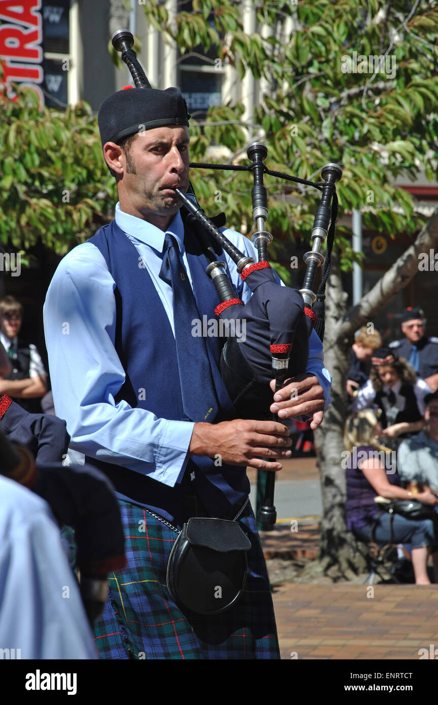 DUNEDIN, NEW ZEALAND, FEBRUARY 21: A pipe band member performs in a competition in the Octagon on February 21, 2010 Stock Photo