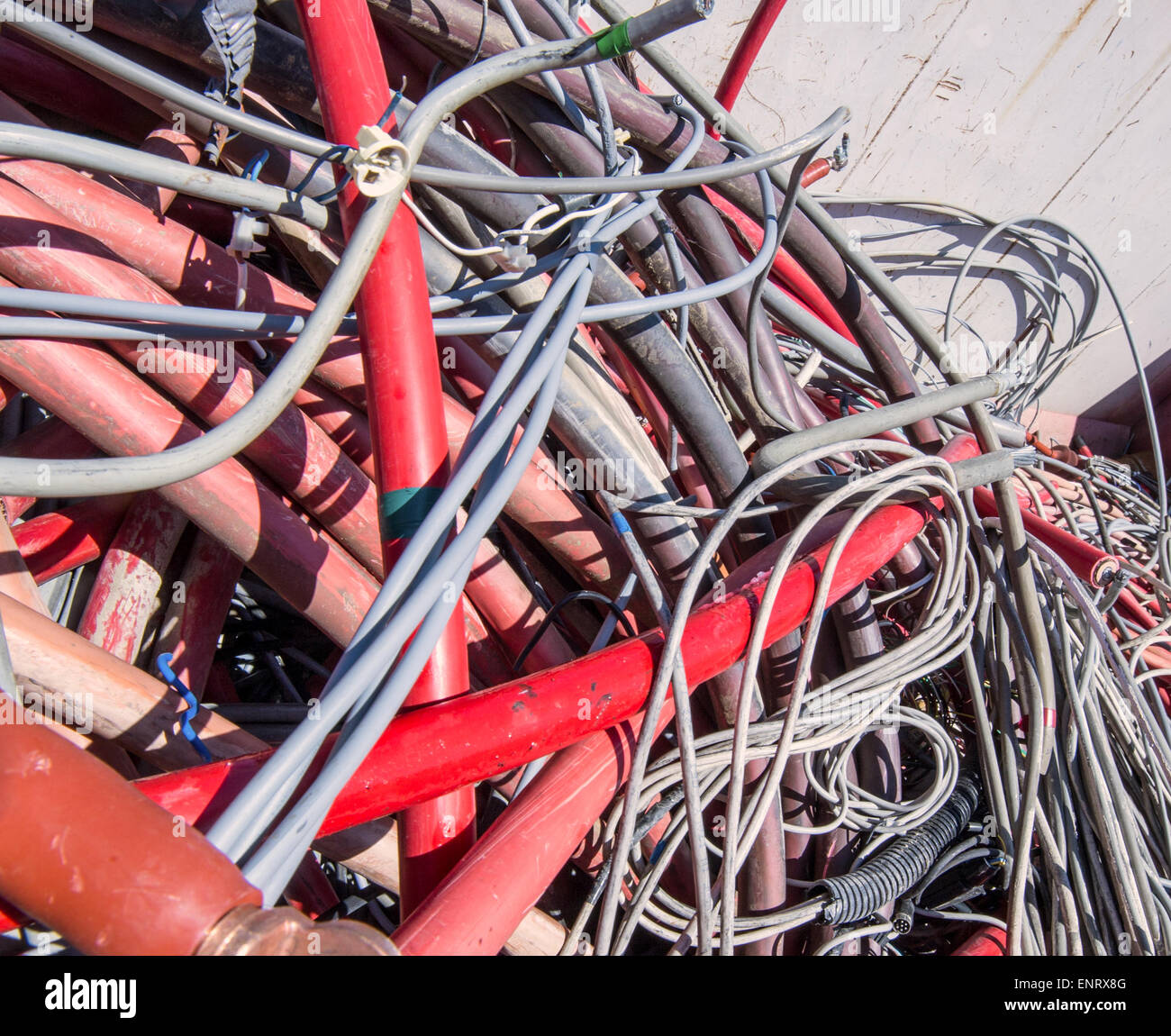 electrical wires and other lengths of copper wire in the dump of