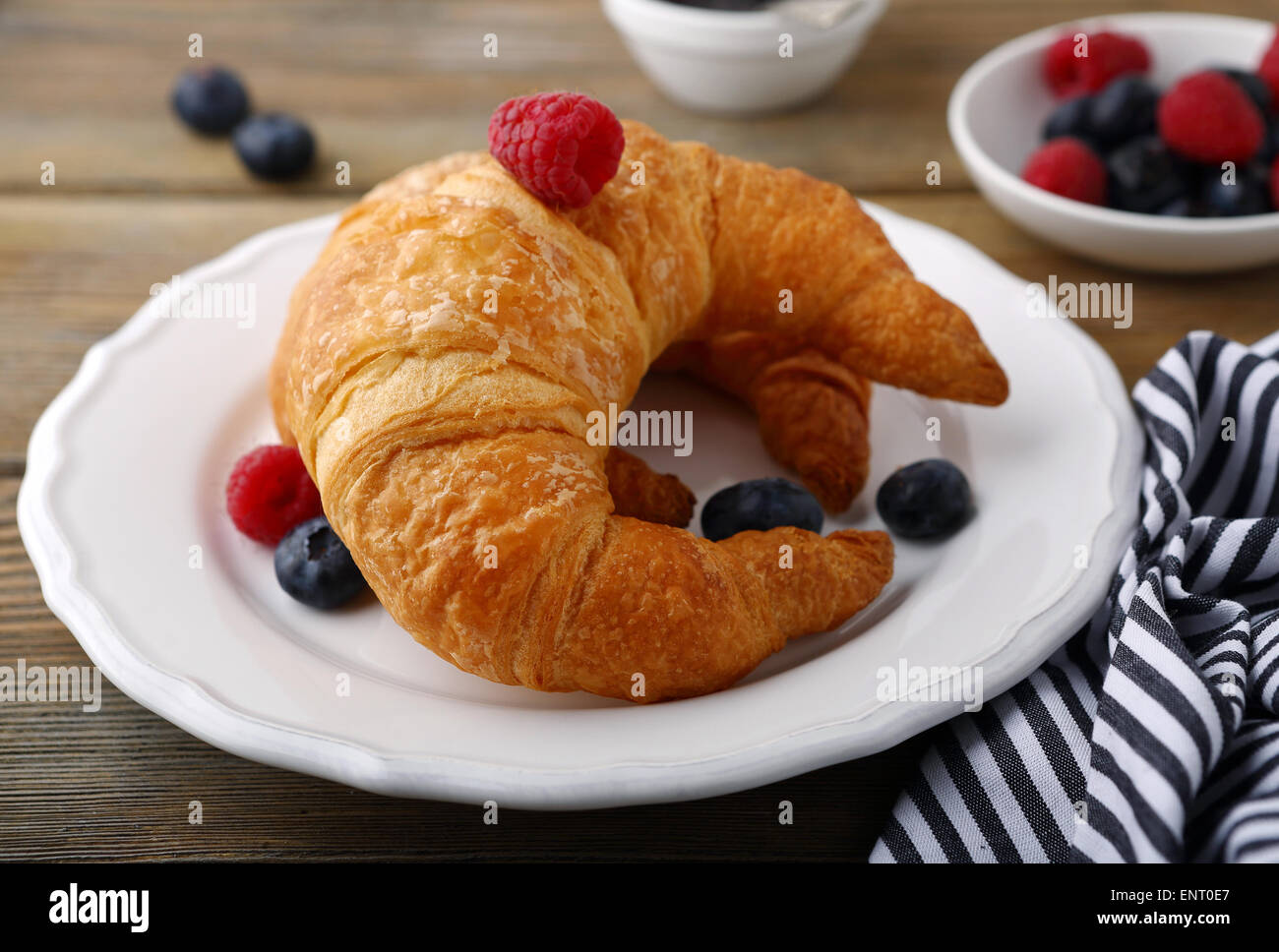 croissant and berries, food closeup Stock Photo