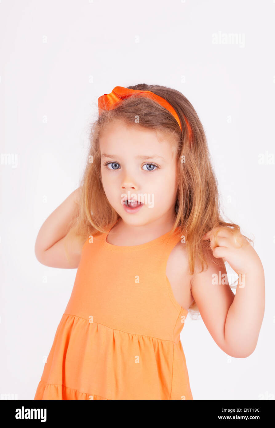 Portrait of a little girl on white background Stock Photo