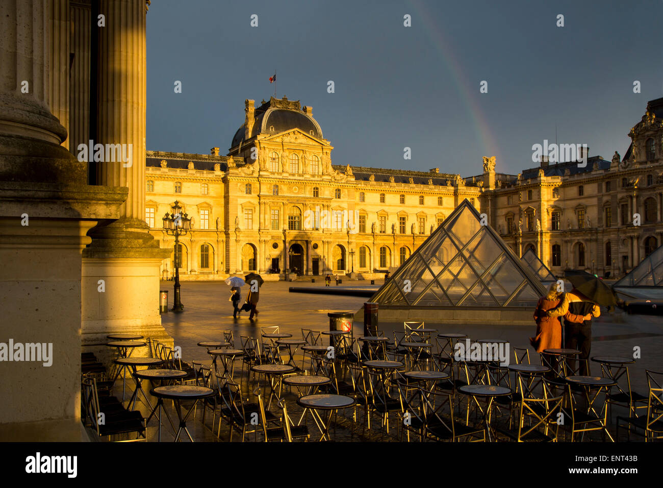 Rainbow over Musee du Louvre at sunset, Paris, France Stock Photo