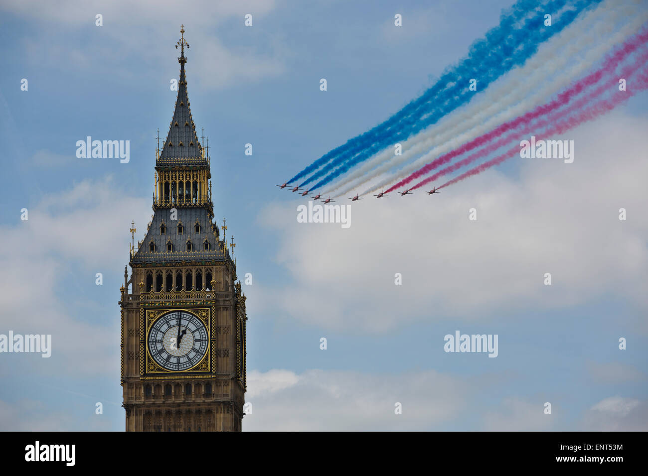 London, UK. 10th May, 2015. Red Arrows fly-past marks VE Day anniversary, Palace of Westminster, London, England, UK 10.05.2015 Huge crowds gathered in Westminster to commemorate 70 years since the Second World War ended in Europe. The Red Arrows performed a fly-past as huge crowds gathered in central London and looked to the skies to watch the Red Arrows and Second World War aircraft perform a fly-past as the weekend's commemorations drew to a close. Credit:  Jeff Gilbert/Alamy Live News Stock Photo