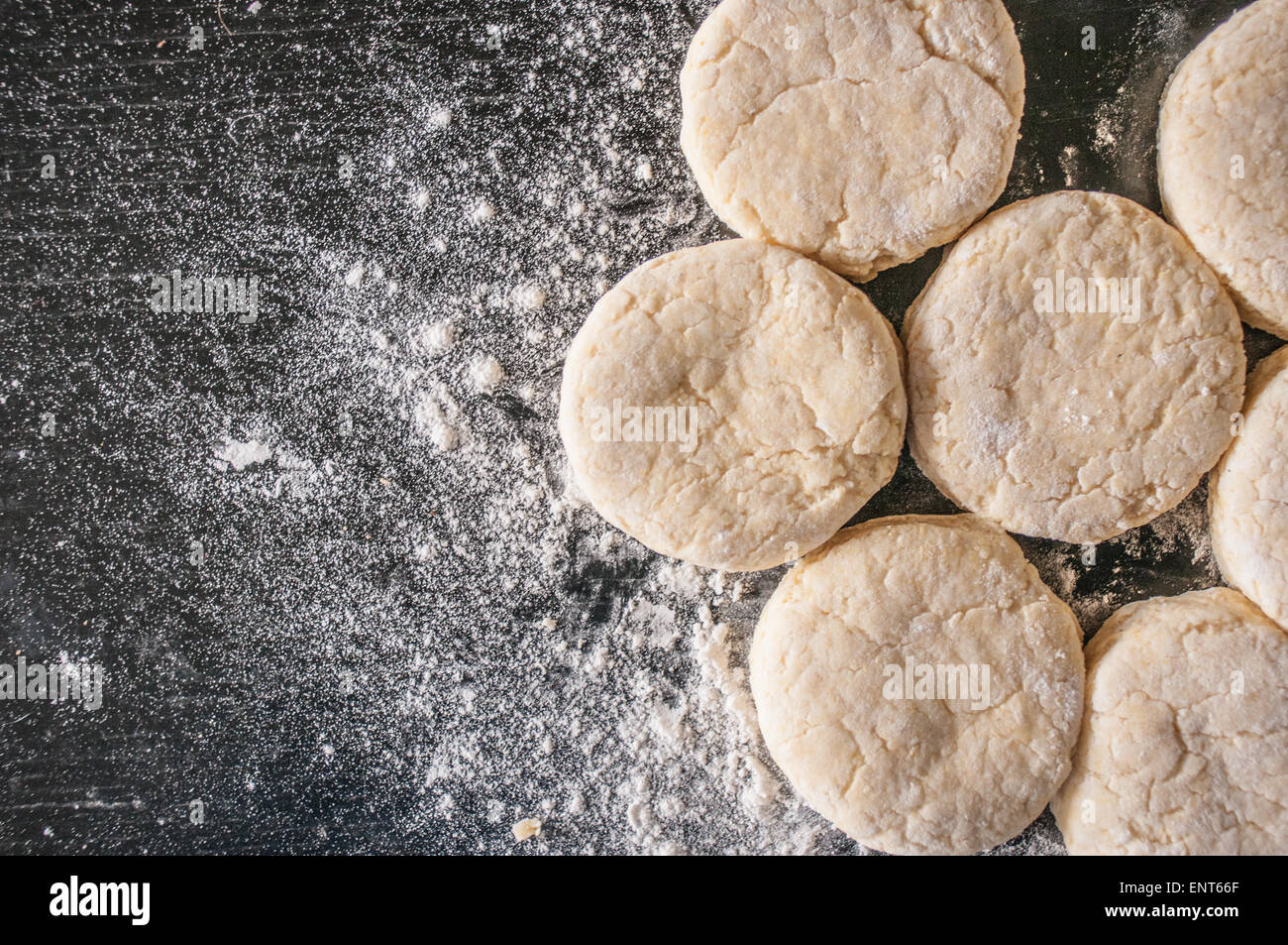 Americanstyle Southern biscuits on a floured wooden surface Stock Photo Alamy