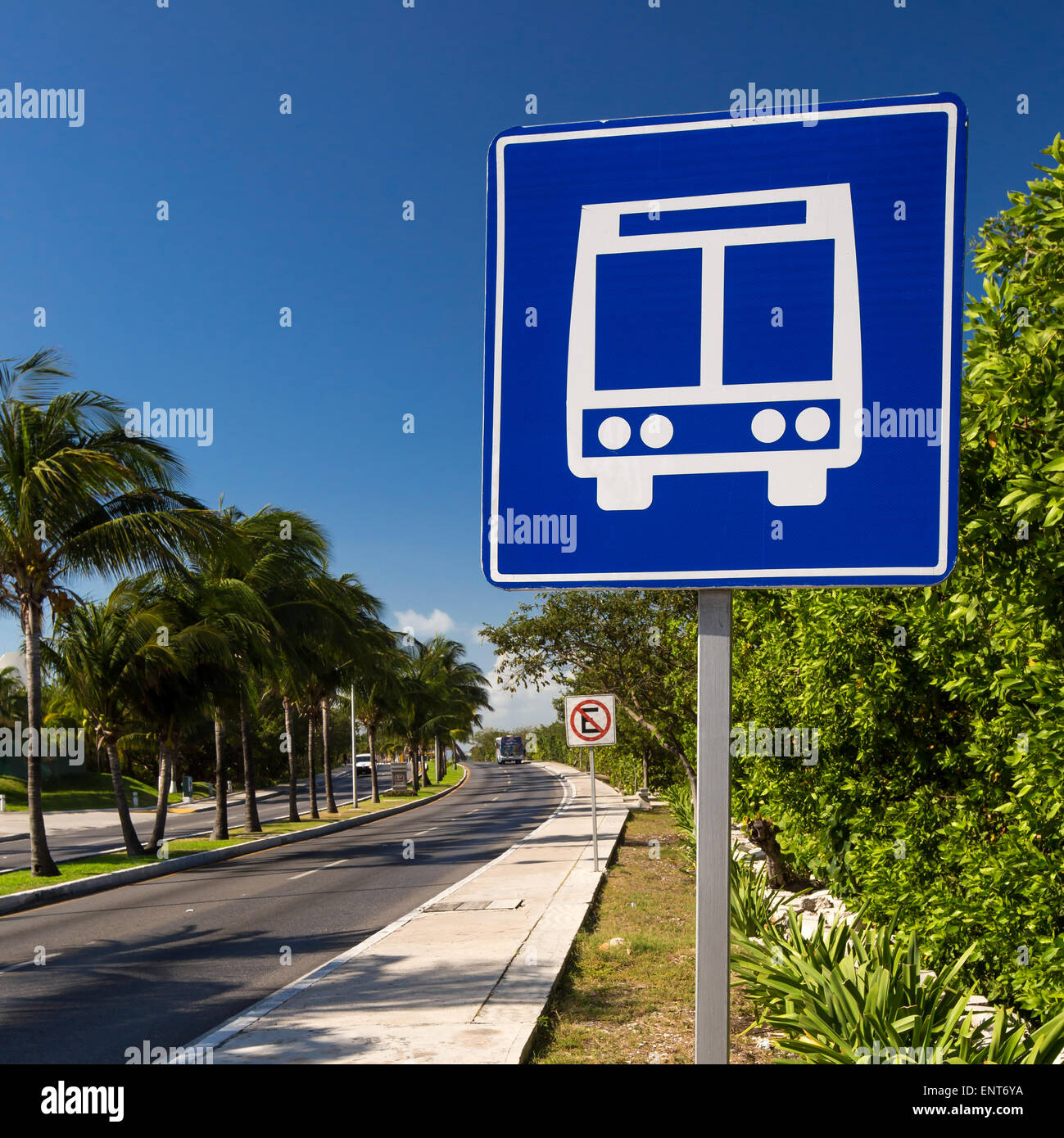 American road public bus stop sign on caribbean street road Stock Photo