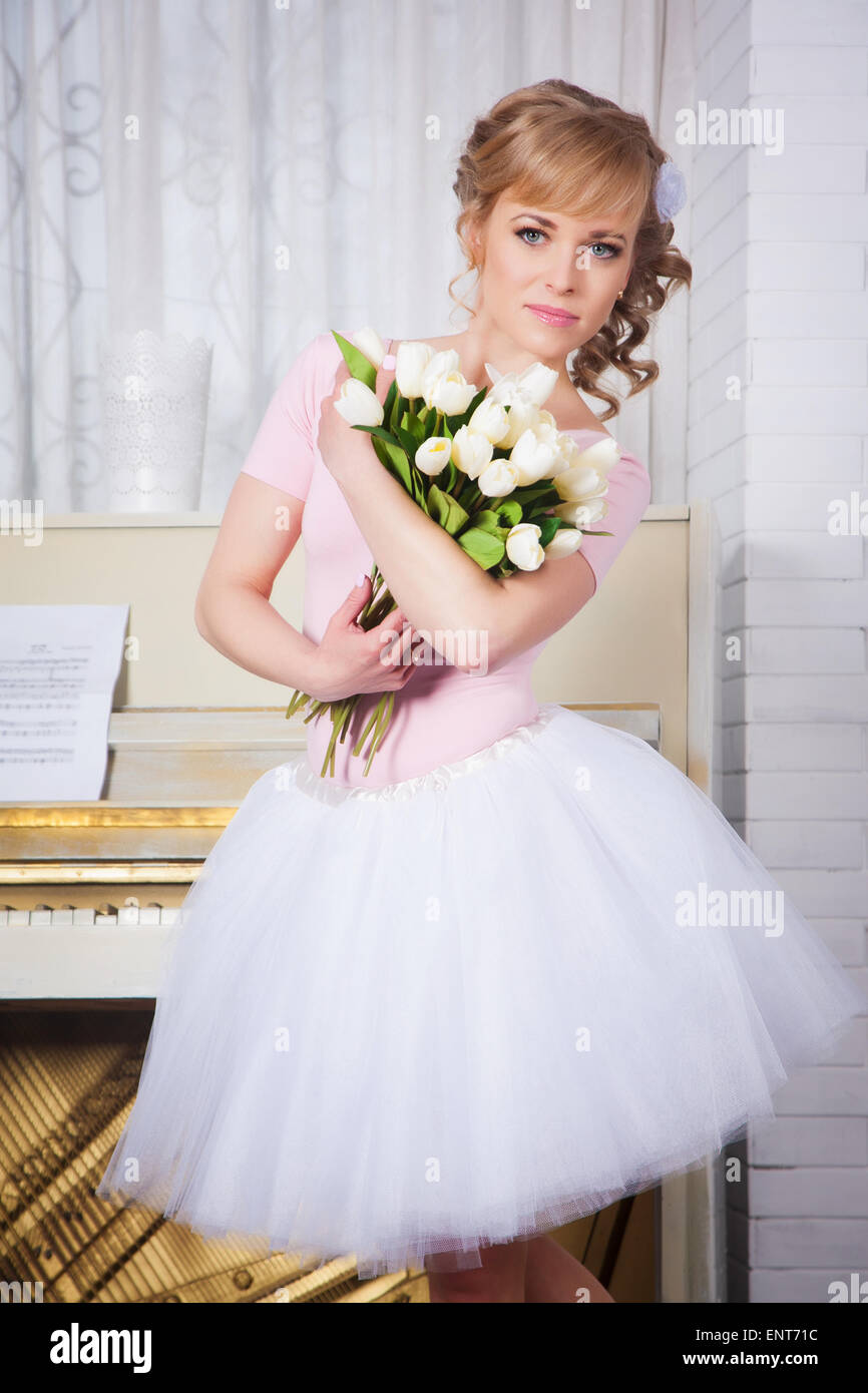 Beautiful ballerina with flowers in the studio Stock Photo Alamy