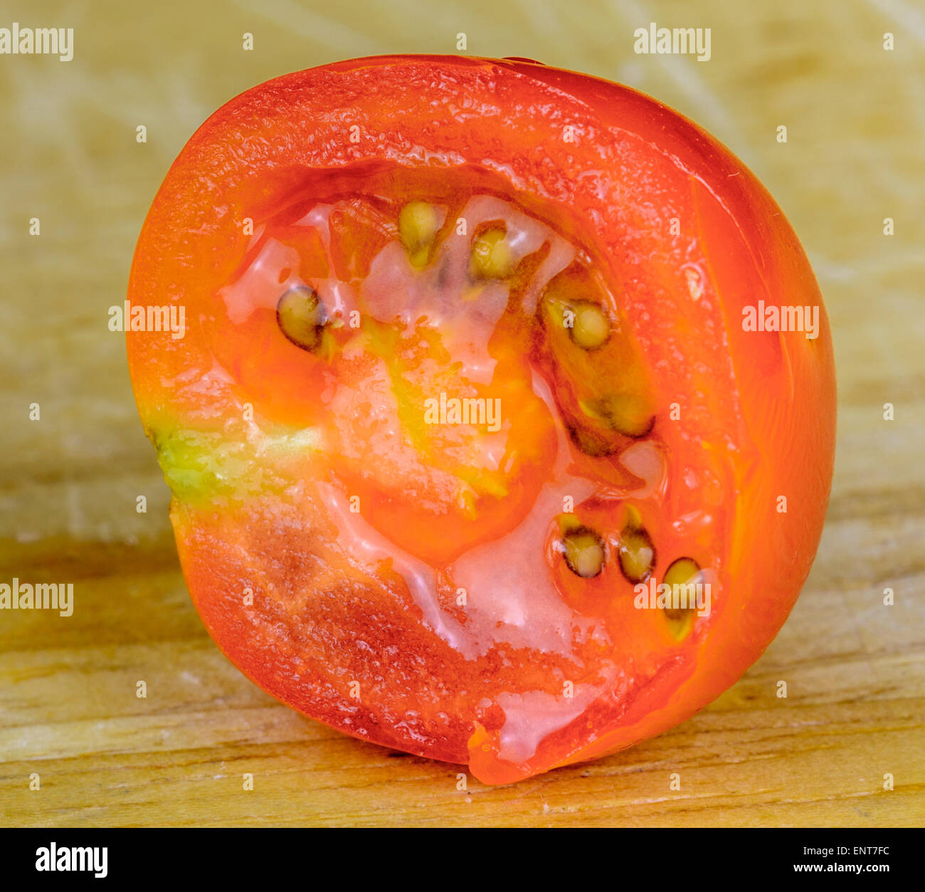 Red cherry tomato cut in half. Stock Photo
