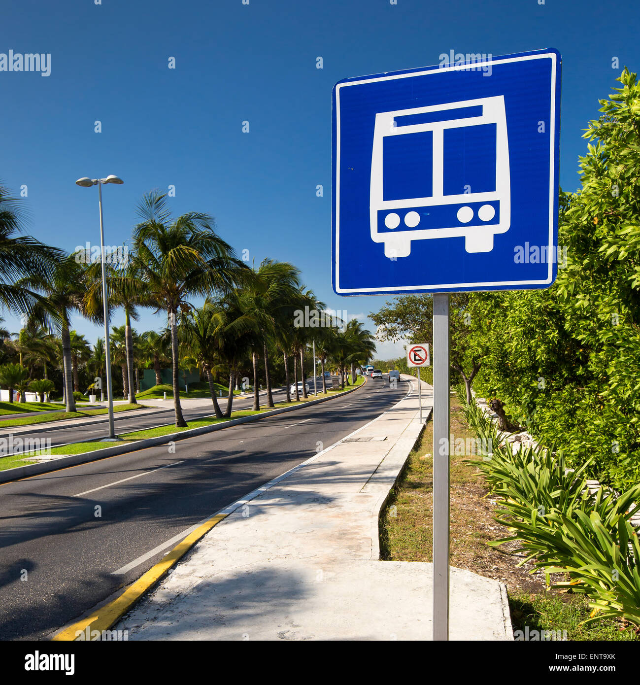 American road public bus stop sign on caribbean street road Stock Photo