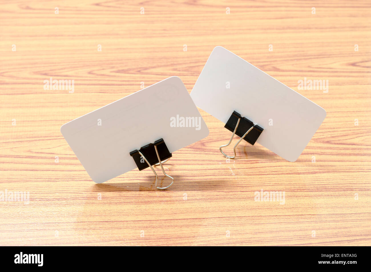 card and clip design on wood background Stock Photo - Alamy