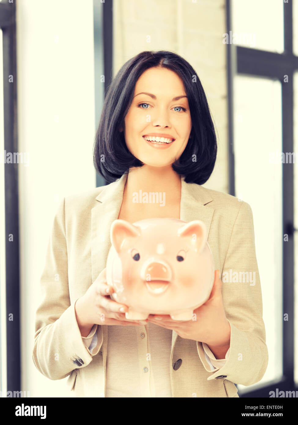 lovely woman with piggy bank Stock Photo - Alamy
