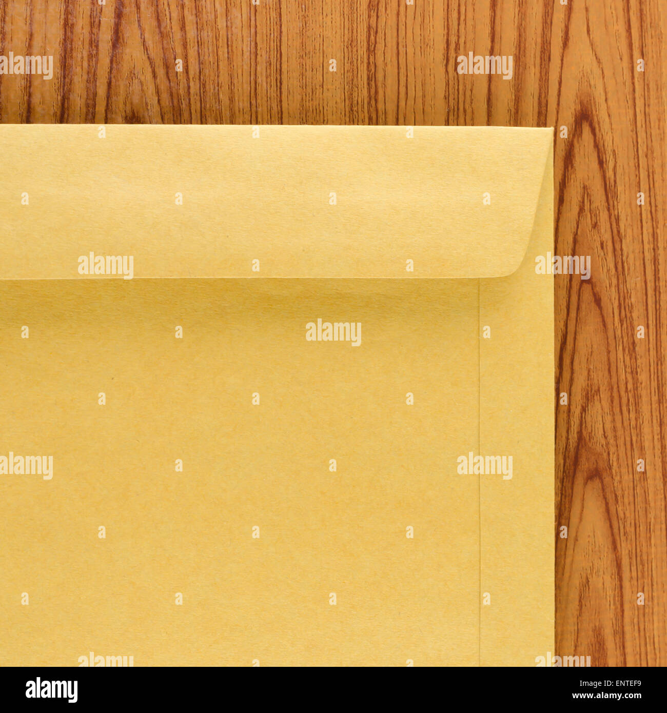 brown envelope on wood table background Stock Photo Alamy
