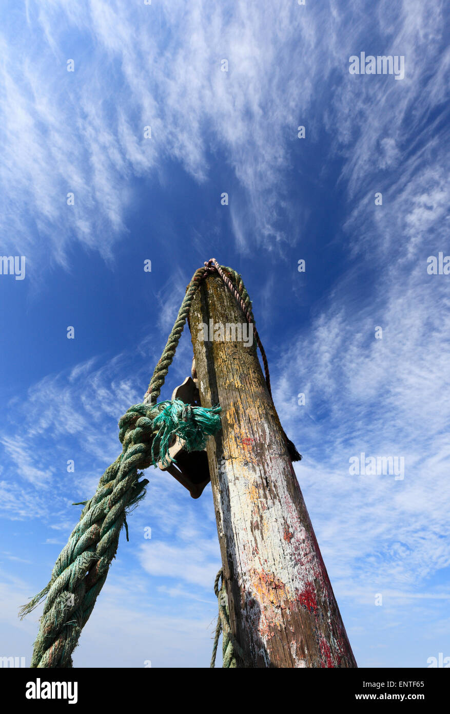 Wooden mooring post at Brancaster Staithe on the North Norfolk coast. Stock Photo