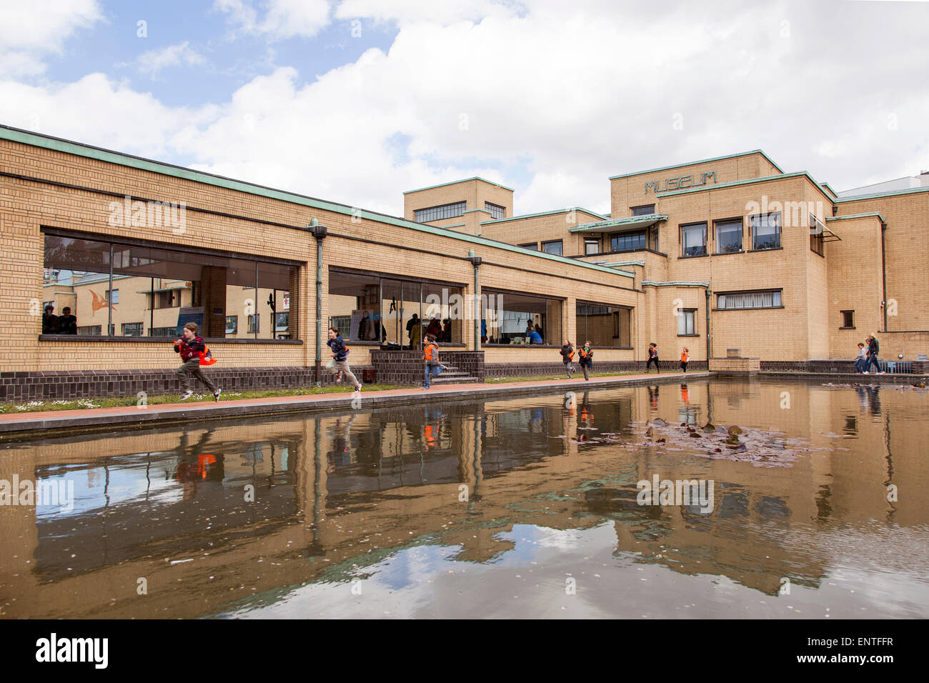 exterior and running children at gemeentemuseum in dutch town of the hague Stock Photo