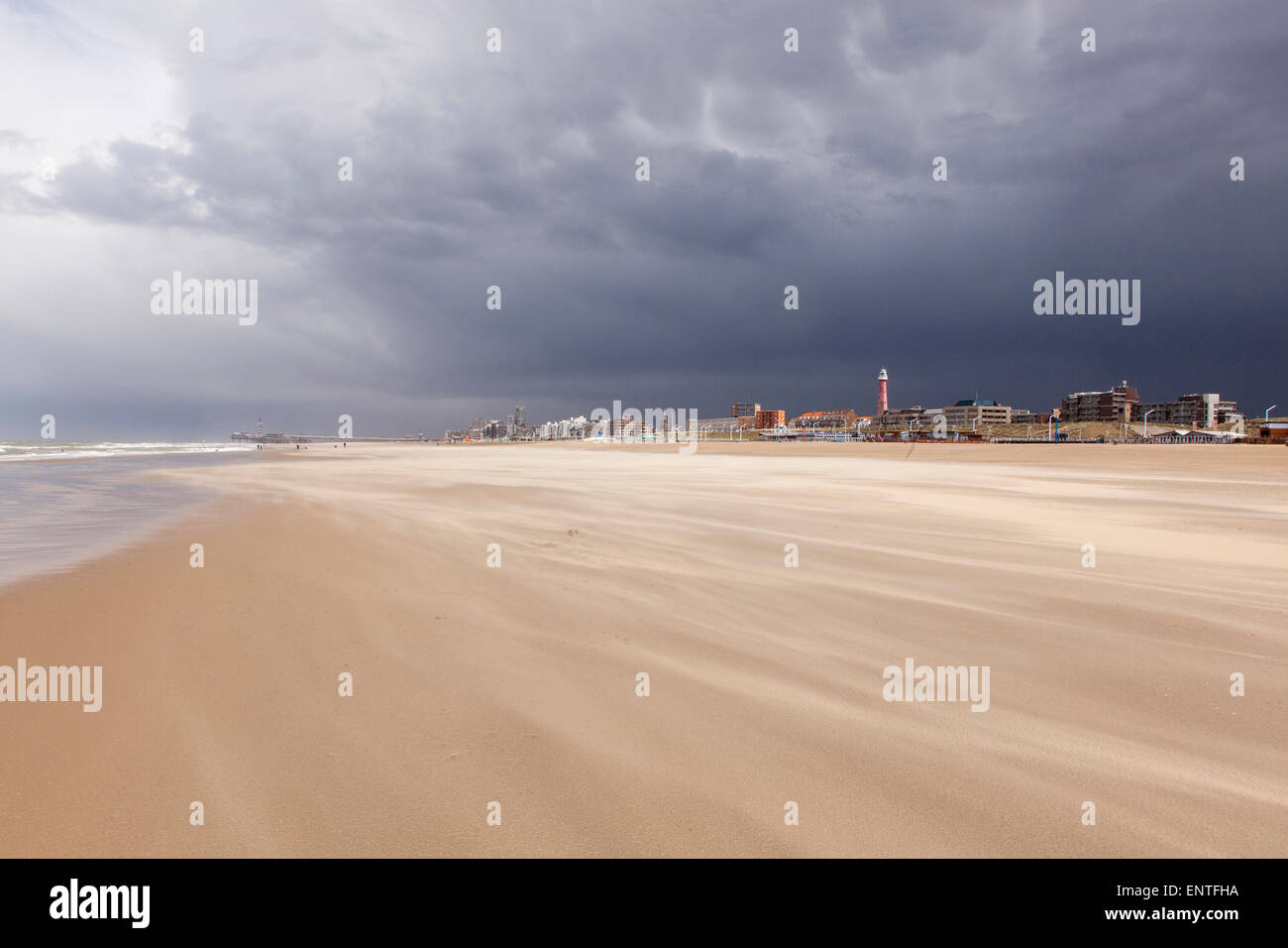 sand storm over Scheveningen beach near Den Haag in the netherlands Stock Photo