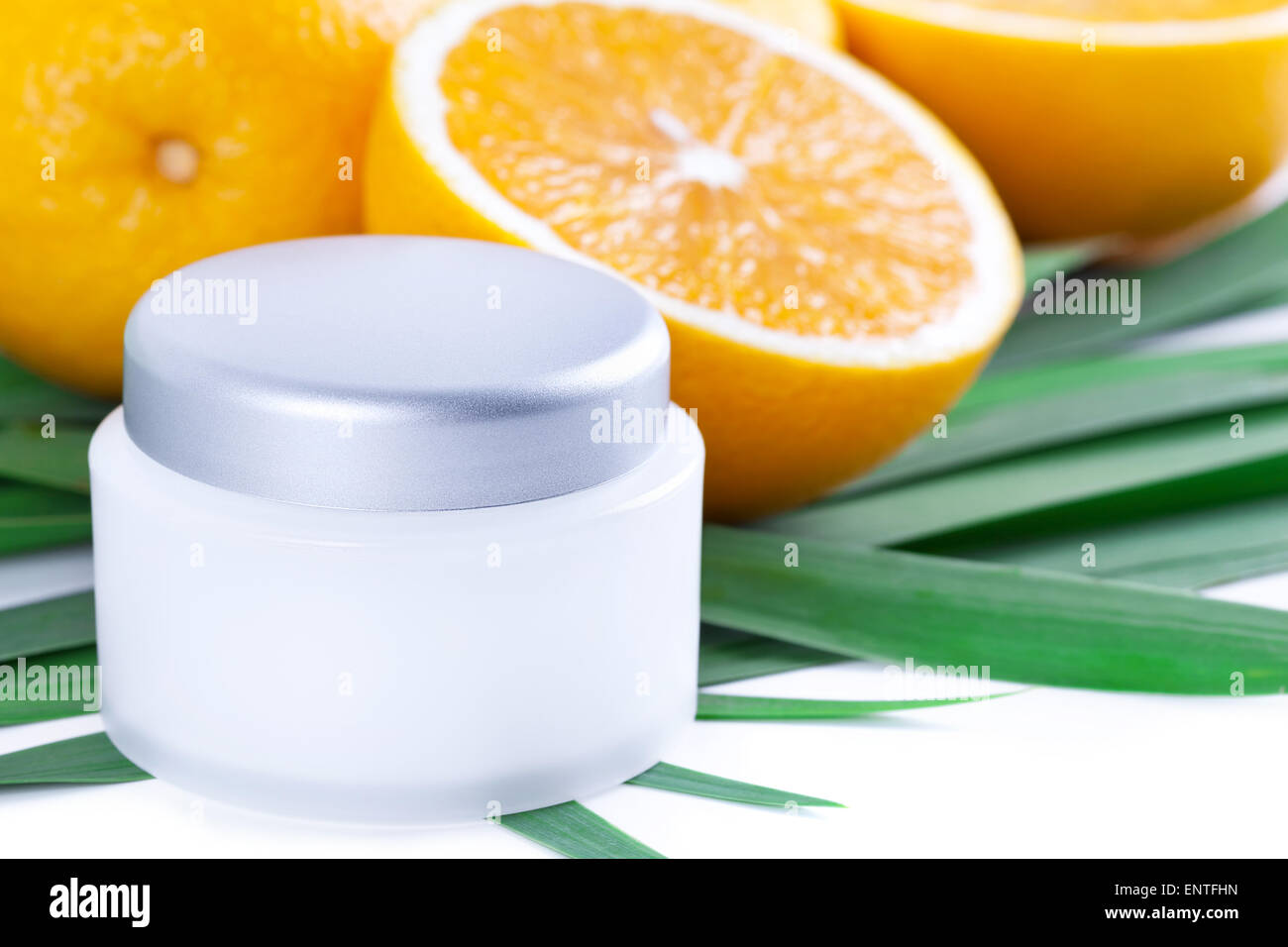 Facial cream with vitamin C, Orange fruit skincare Stock Photo Alamy