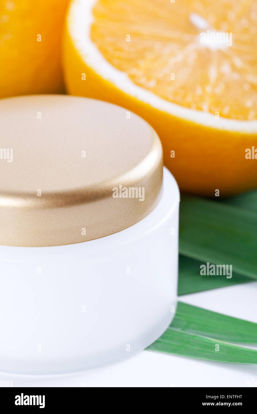 Facial cream with vitamin C, Orange fruit skincare Stock Photo Alamy