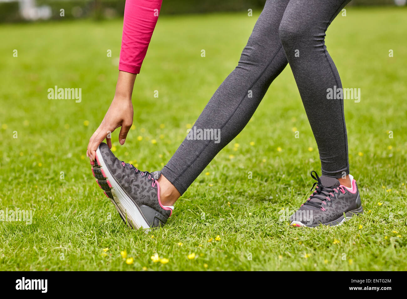 Girl stretching feet hi-res stock photography and images - Alamy