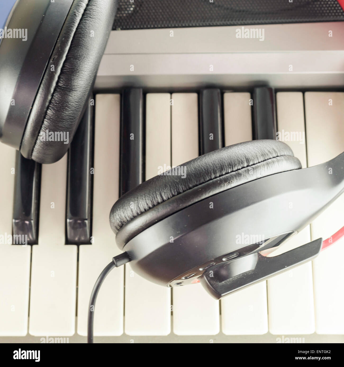 headphones on electric  music instrument piano keyboard Stock Photo