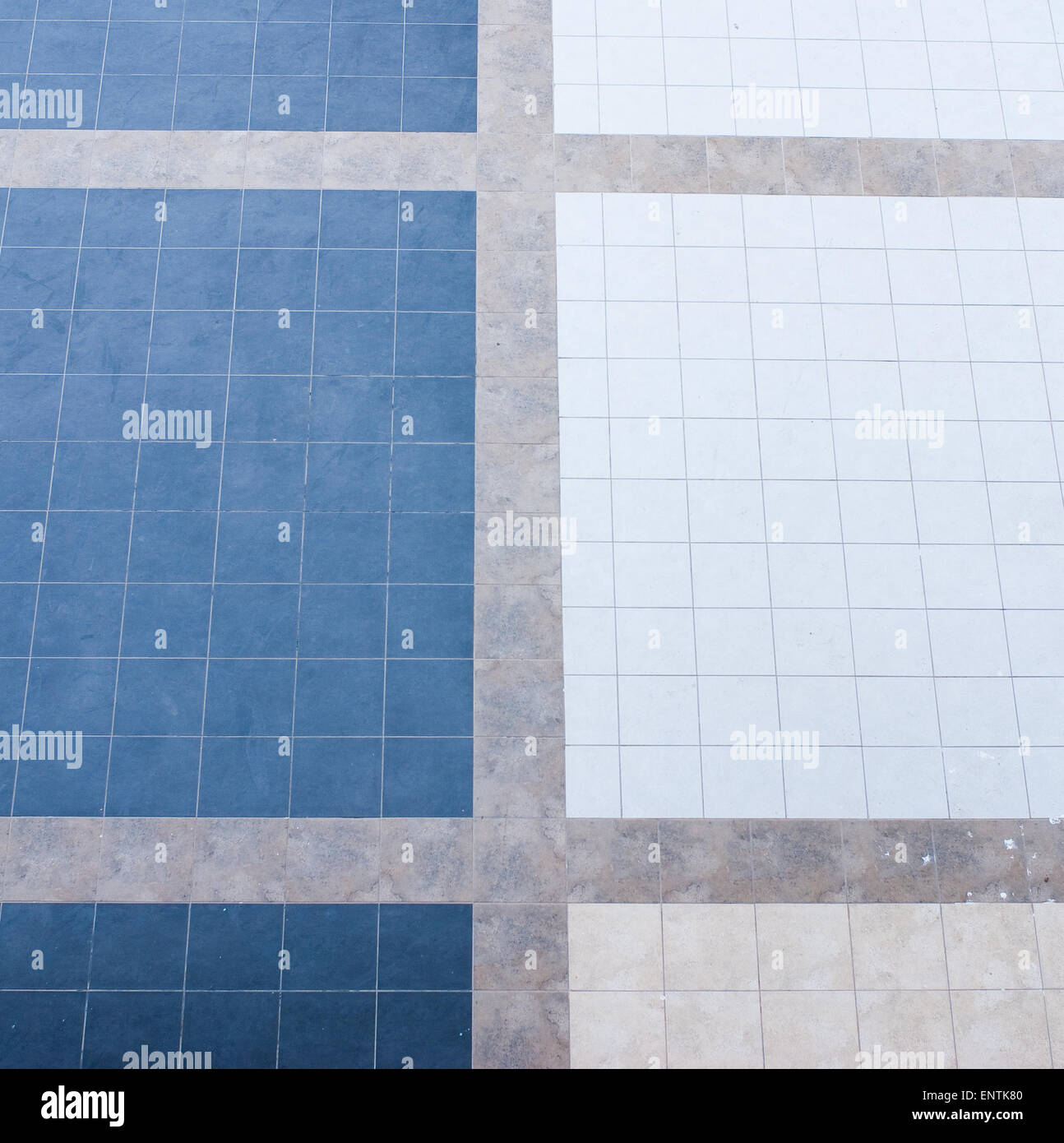 blue and white square tiles on a facade surface Stock Photo