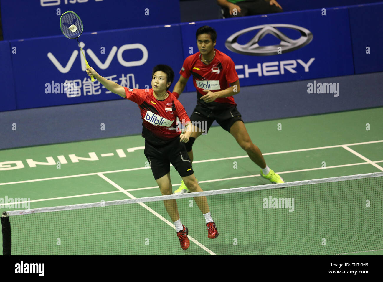 Dongguan, China's Guangdong Province. 11th May, 2015. Mohammad Ahsan and Hendra Setiawan (L)of Indonisa compete during the preliminary match against Andrew Ellis and Peter Mills of England at 2015 Sudirman Cup BWF World Mixed Team Championships in Dongguan, east China's Guangdong Province, May 11, 2015. Credit:  Meng Yongmin/Xinhua/Alamy Live News Stock Photo