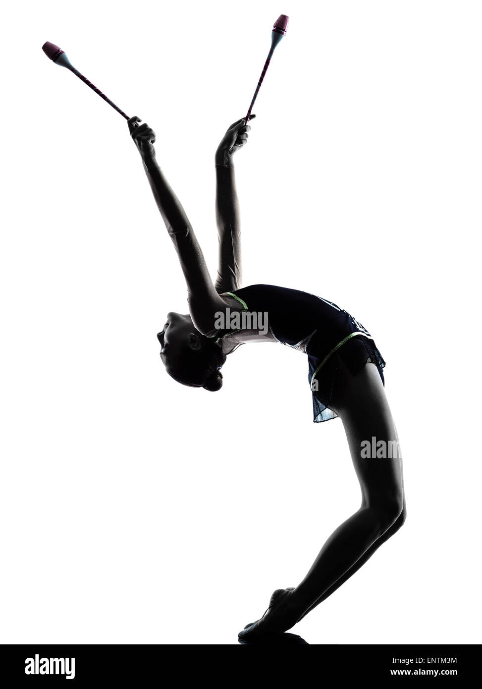 one caucasian woman exercising Rhythmic Gymnastics in silhouette isolated on white background Stock Photo