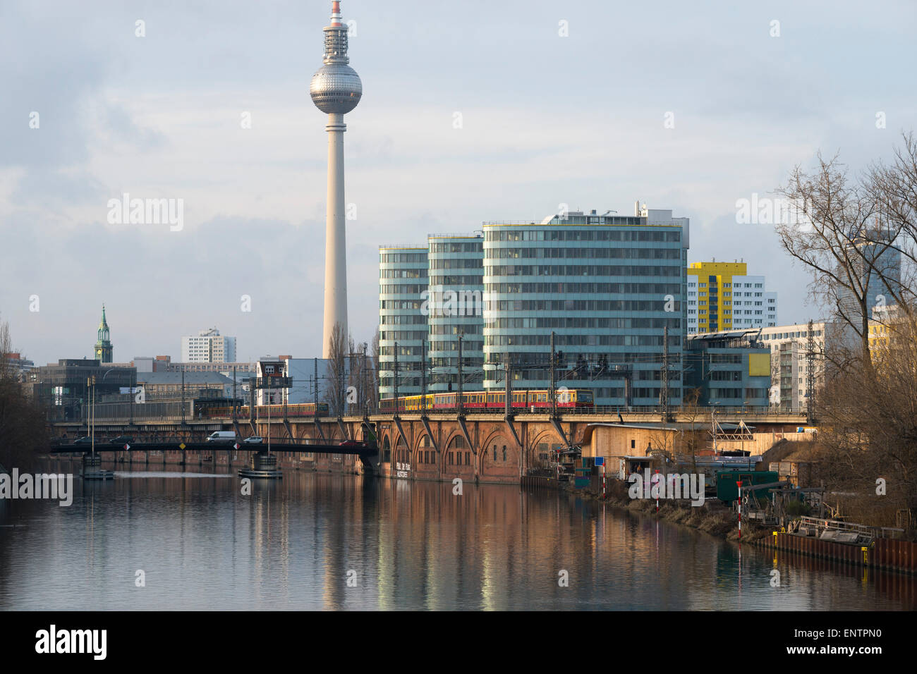 Spree river view in central Berlin with moving train and TV tower Stock Photo