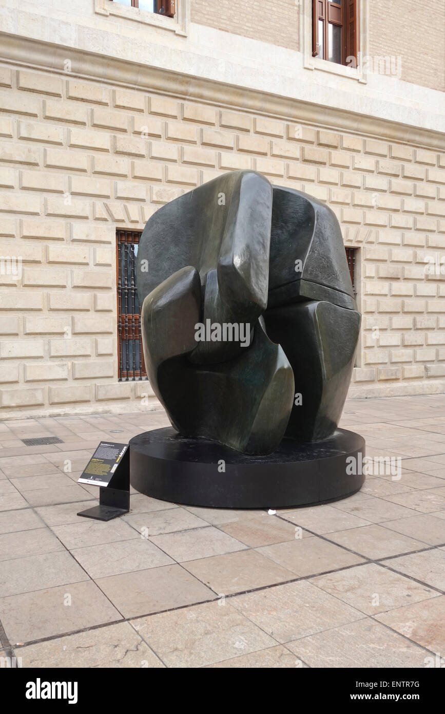 Bronze sculpture 'locking piece' of sculptor artist Henry Moore on display in the streets of Malaga city, Andalusia, Spain. Stock Photo