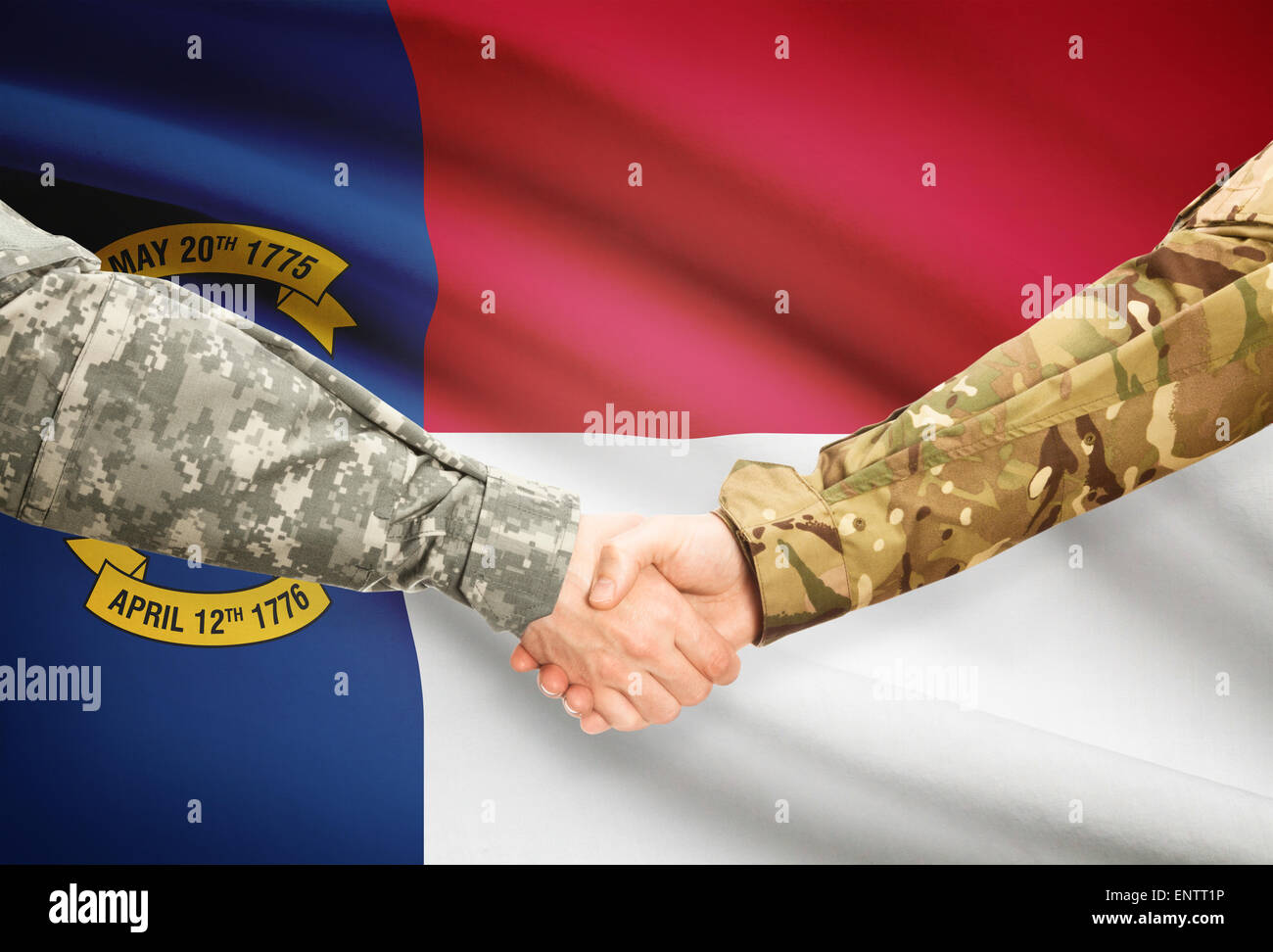 Soldiers handshake and US state flag North Carolina Stock Photo Alamy