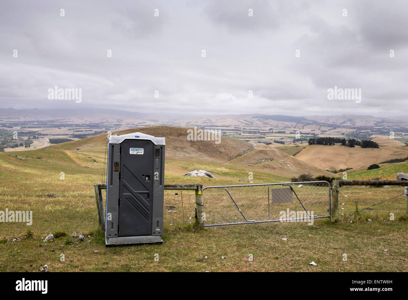 Portable toilet on the walk through farmland to the summit of Mount Cass, Canterbury, New Zealand. Stock Photo