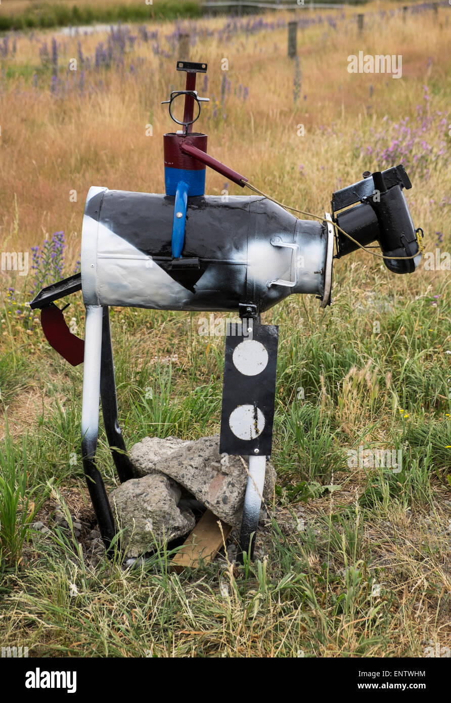 Novelty mailbox made from a milk churn and other metal parts, Mount Cass, Canterbury, New Zealand. Stock Photo