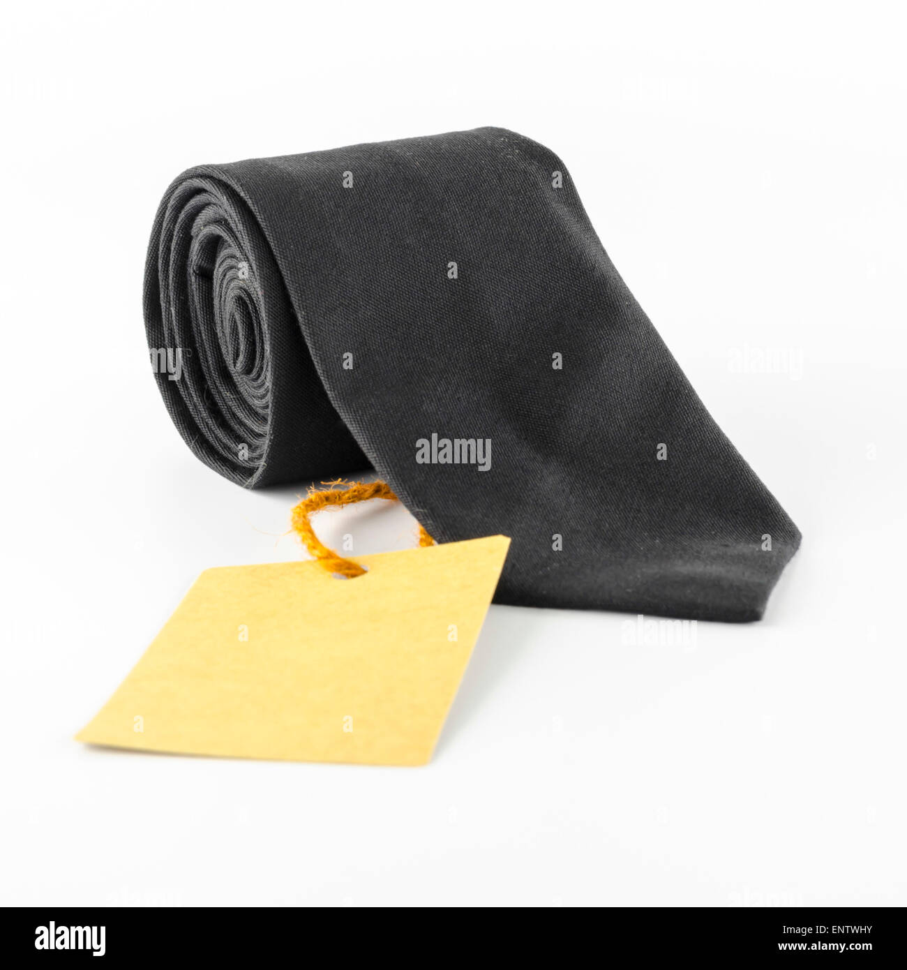 neck tie and cost tag on a white background Stock Photo Alamy