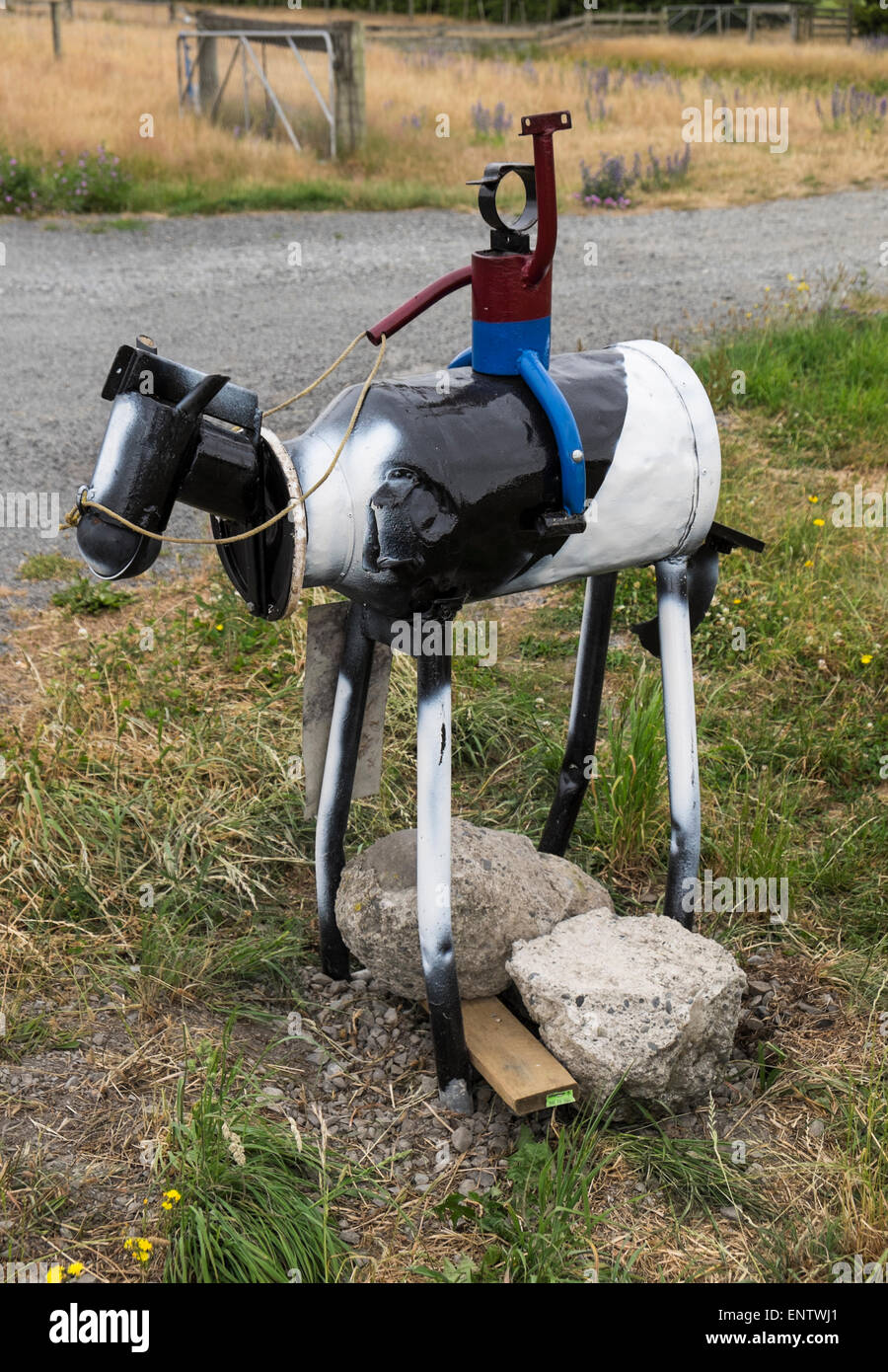 Novelty mailbox made from a milk churn and other metal parts, Mount Cass, Canterbury, New Zealand. Stock Photo