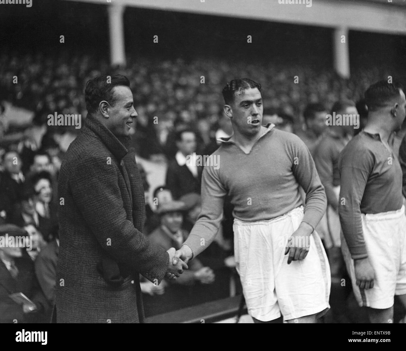 Dixie Dean, the legendary Everton centre forward, being introduced to Spanish international footballer Zamora at Goodison Park. December 1931 . Stock Photo