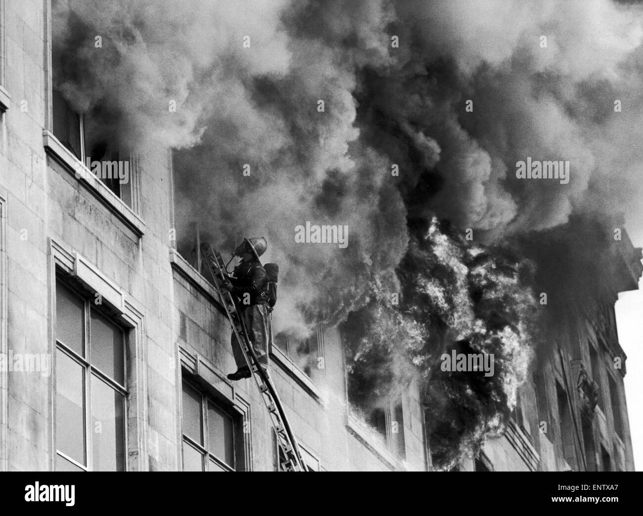 Fire at Woolworths departent store in central Manchester, Tuesday 8th May 1979. The store was the largest Woolworths in Europe, with six floors plus two basement levels. The fire, which started in the second floor furnishing department, killed nine shoppers and one member of staff. It is believed that the fire was started by a damaged electrical cable, which had furniture stacked in front of it. Stock Photo